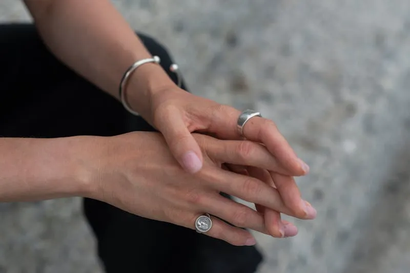 Wearing silver ring in different fingers​